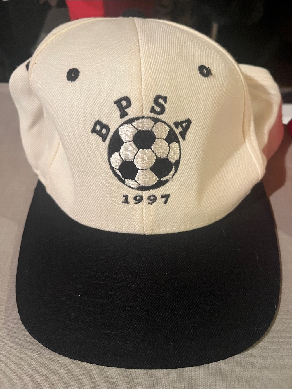 Cream and Black Soccer Logo Baseball Cap - BP SA 1997